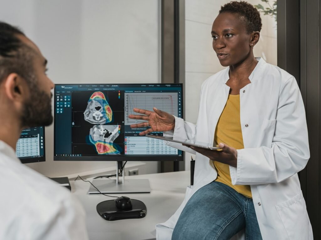 Two clinicians review a care plan together